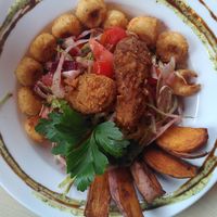 The beach salad with palm heart calamari, sweet potato wedges and fried 'chicken' at Voltaire in Bangor