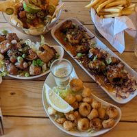Nachos, teriyaki tofu, calamari and buffalo wings at Voltaire in Bangor