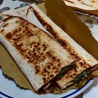 Rotolo con crema di carciofi, zucchine, funghi, rucola (con aggiunta di salsa al tartufo) at Stuzzicheria Romagnola in Cervia