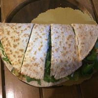 Piadina with hummus, zucchini, rucola and nuts at Stuzzicheria Romagnola in Cervia