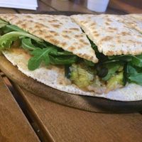 Piadina with hummus, zucchini, rucola and nuts at Stuzzicheria Romagnola in Cervia