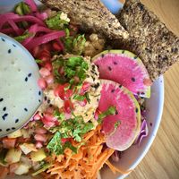 Cauliflower tahini bowl w/ hummus, seed cracker/flatbread. Delicious! at Kupfert & Kim - Spadina in Toronto