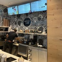 When you enter the building, take the escalator up one to the second floor  at Kupfert & Kim - Waterpark Place in Toronto