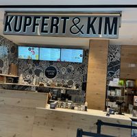They are located 2nd floor. To the right when you take the escalator. at Kupfert & Kim - Waterpark Place in Toronto