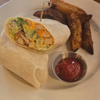 Chick'n wrap that was on special for $15 ish, wedges as a side at Plant Matter Kitchen in London