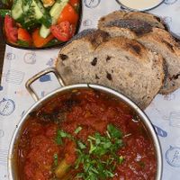 Vegan shakshuka (with veggie patties )  at Puaa Cafe  in Tel Aviv