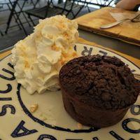 Tortino vegano pera e cioccolato con panna at FUD in Palermo