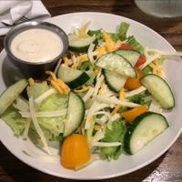Side salad with dairy-free ranch and cheeze.  at Mozzarella Fellas in Winston-salem