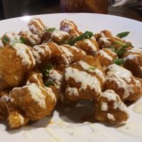 Vegan cauliflower bites with vegan ranch!!! These were delicious! at Mozzarella Fellas in Winston-salem