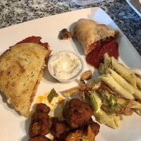  Chicken parm sandwich, mushroom sausage calzone, Demons (buffalo cauliflower wings (came with ranch)), and fire proof (mac n cheese w/ jalapeño and fried onion). Delicious!!  at Mozzarella Fellas in Winston-salem