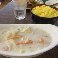 The green curry looks pale but had plenty of spice!  at Cafe Thailand in Cairns