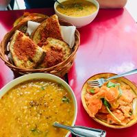 Yellow lentil soup, carrot salad and Bread with red Pesto  at St. Agnes Kafé in Gothenburg