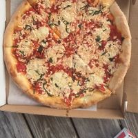 Margarita pizza with vegan cheese  at Mario's Pizza in Ocean City