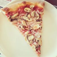 The pizza slices are huge! at Mario's Pizza in Ocean City