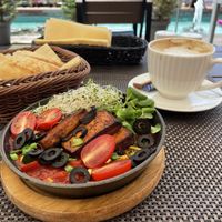 Shakshuka with tofu and vegan cappuccino   at Zielona in Lodz