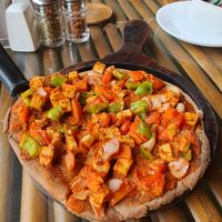 Vegan vegetable tofu Pizza with ragi flour at Pure Soul Cafe in Rishikesh