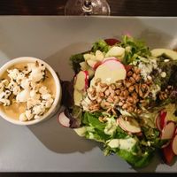 First and second courses plated together  at Harvest Beat in Seattle