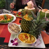 pineapple curry, coconut curry and sweet and sour tofu on the side at Piccolo Thai Food & Wine in Isola Del Giglio