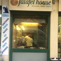 front of shop at Falafel House in Athens
