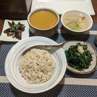 Entree of curry with sides of soup, greens, and eggplant. at Hsia An Chu Vegetarian in Taitung