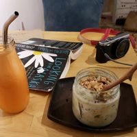 Granola and orange/carrot juice. at La Studio in Hanoi