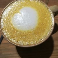 Amazing turmeric latte at La Studio in Hanoi