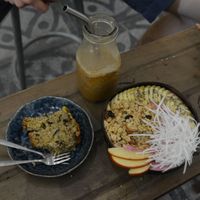 coconut coffee, banana bread, smoothie bowl at La Studio in Hanoi