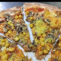 fungi with vegan cheese and sweetcorn at ICCO in London