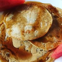 Vegan pancakes with agave type syrup at Nakum in Flores