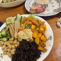 Frieda Kahlo Bowl and one left out of 4 fresh spring rolls with a tahini sauce  at Simple Things in Kampot