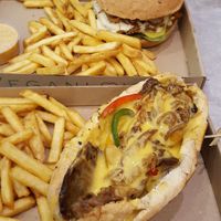 Seitan philly cheese steak sandwich and the bbq tofu burger. Smoked paprika dips at Vegan Love in Budapest