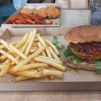 Sweet potato burger with regular fries at Vegan Love in Budapest