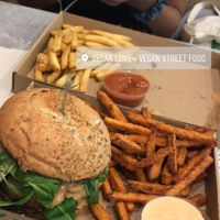 Jucy lucy burger with sweet patatoe fries  at Vegan Love in Budapest