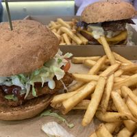 “chicken” burger with the big kahuna in the background  at Vegan Love in Budapest
