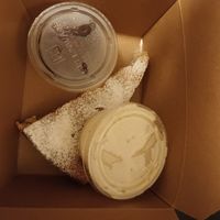 Ordered to go: cream cake with sides of sour cherries and frosting. at Apteka in Pittsburgh