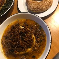 Smazonka z Baklazanu i Kaszy (fried eggplant, buckwheat, tomato, and chanterelles over potato with double fat, tomato and herb au jus and bread) at Apteka in Pittsburgh