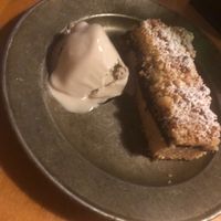 Ciasto ze Sliwka i Lodawi (crumb cake with Hungarian blue plum jam and sunflower seed milk ice cream)  at Apteka in Pittsburgh