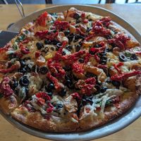 Greek pizza with daiya cheese at Blue Line Pizza in Mountain View
