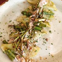 Ravioli filled with vegan cheese and asparagus, with walnut cream on the top at Rifugio Romano in Rome