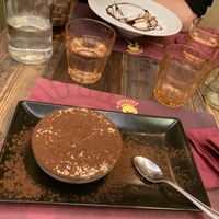 Delicious tiramisu and sad broken panna cotta! at Rifugio Romano in Rome