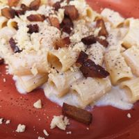 Mezzemaniche alla gricia vegan at Rifugio Romano in Rome