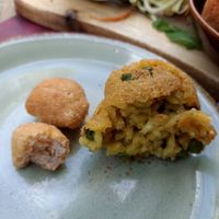 Vegan starter - bread, rice and cheese fritter at Rifugio Romano in Rome