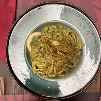 Tonnarelli acqua e farina con carciofi,limone e granella di pistacchio veg  at Rifugio Romano in Rome