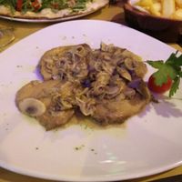 Seitan steaks in mushroom sauce at Rifugio Romano in Rome