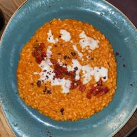 Red pepper risotto with cashew cream  at Rifugio Romano in Rome