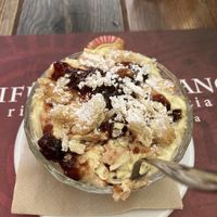 Very good textures in this dessert love the biscotti crumb and fruit compote   at Rifugio Romano in Rome