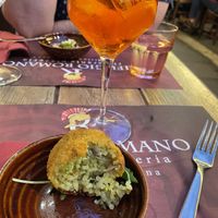 Vegan arancini. A must try!  at Rifugio Romano in Rome