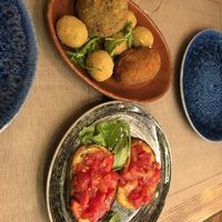 Vegan arancini, stuffed olives and bruschetta   at Rifugio Romano in Rome