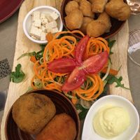 Sharing platter with arancini and tofu feta  at Rifugio Romano in Rome