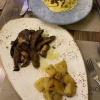 tagliata de seitan and spaghetti carbonara  at Rifugio Romano in Rome